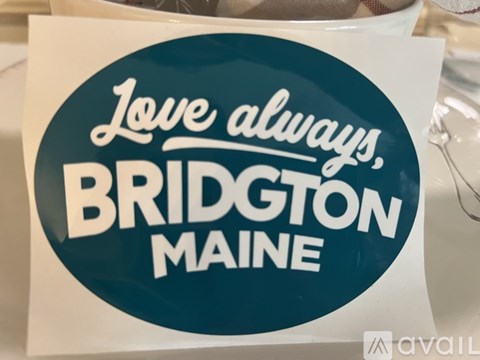 A sticker that says "Love always, Bridgton Maine" is displayed.