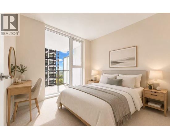 A bedroom with a large bed, a desk with a chair, and a window with a view of the city.
