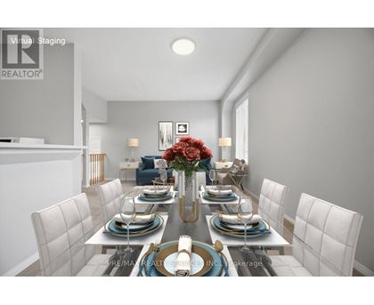 A dining room with a table set for six people.