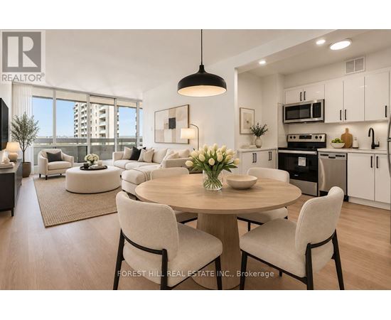 A modern dining room with a round table and chairs.