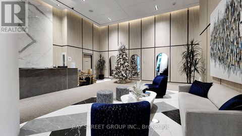 A modern office lobby with a reception desk and a Christmas tree.
