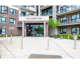 The entrance to a building with the sign 1105 Leger Way.