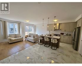 A spacious kitchen and living room with a marble floor.
