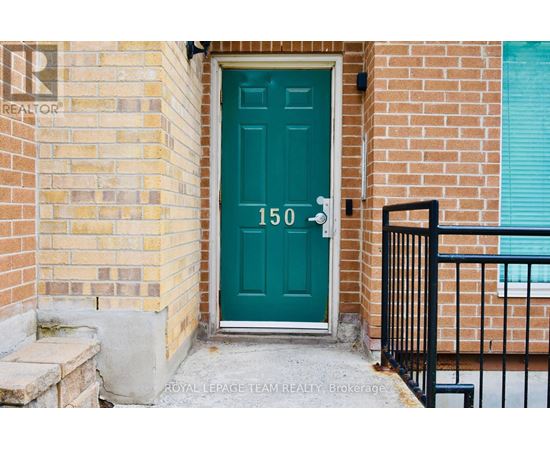 A green door with the number 150 on it.