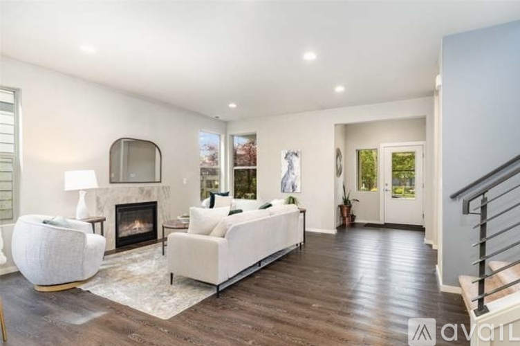 A living room with a fireplace and a couch.