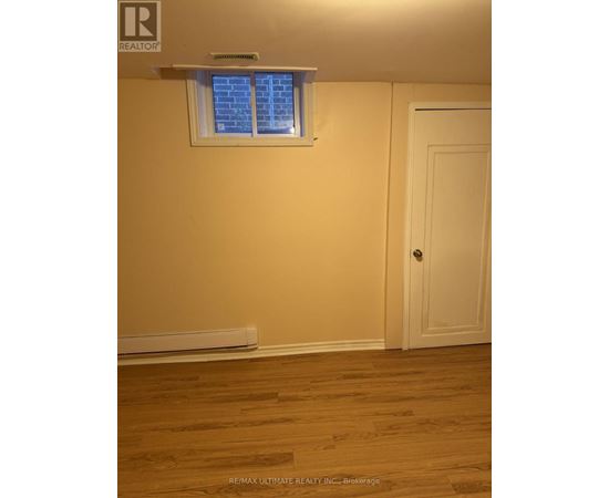 A room with a window and a door.