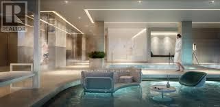 A modern living room with a pool in the middle.