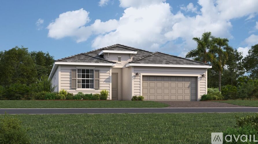 A house with a garage is available for sale.