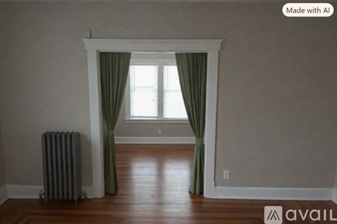 A room with a window, curtains, and a radiator.
