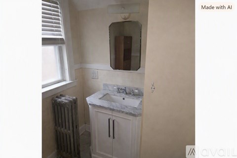 A small bathroom with a sink and a mirror.