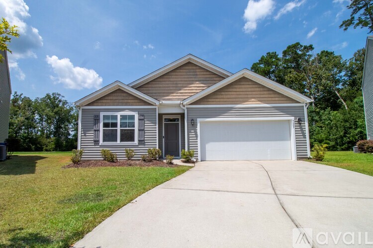 A house with a garage is available for sale.