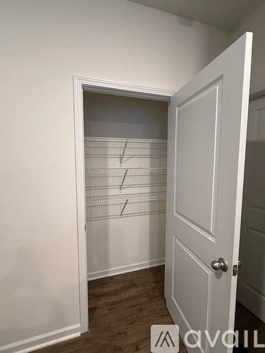 A white door with a glass window and a handle.