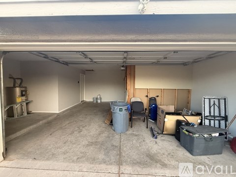 A storage room with a lot of boxes and containers.