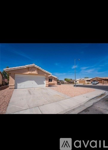 A house with a garage is available for sale.