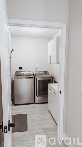 A small kitchen with a dishwasher and an oven.