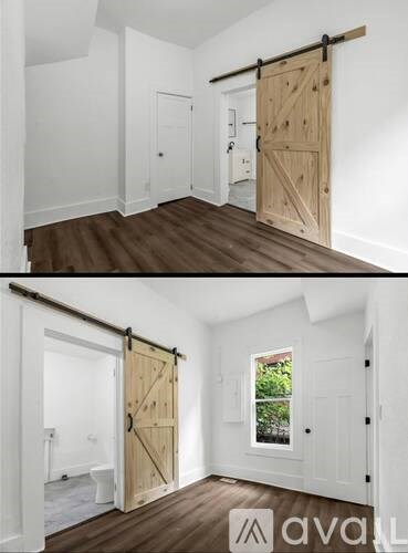 A room with a sliding door and a window.