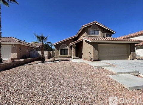 A house with a driveway in front of it.