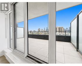 A white window with a view of a city skyline.