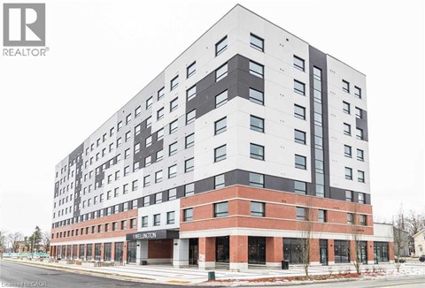A large building with a lot of windows and a sign that says Thelinton.