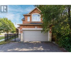 A house with a garage is for sale.