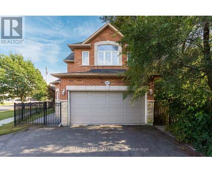 A house with a garage is for sale.