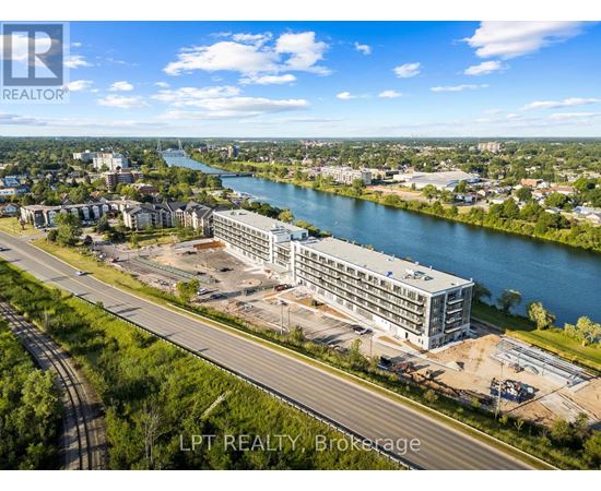 A real estate brokerage is advertising a property with a river view.