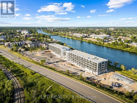 A real estate brokerage is advertising a property with a river view.