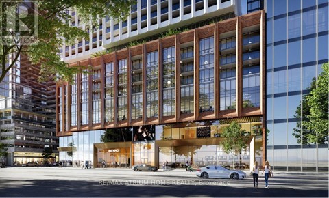 A modern building with a glass facade and a wooden structure in the middle.