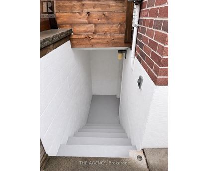 A set of stairs leading to a basement.