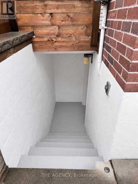 A set of stairs leading to a basement.