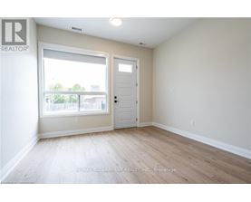 A room with a door and a window.