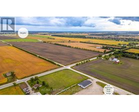 A real estate brokerage firm is advertising a property in the image.