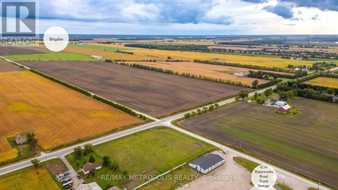 A real estate brokerage firm is advertising a property in the image.