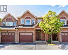 A large brick house with a tree in front and a sign that says "HOME RUN REALTY INC Brokerage".