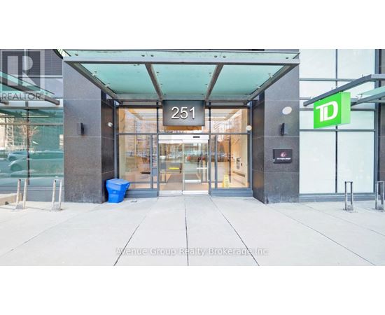 The entrance to a building with a glass door and a sign that reads "251".