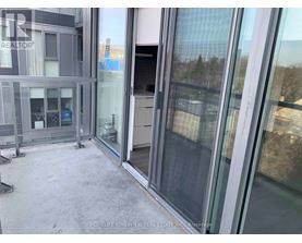 A glass door with a handle is part of a building's exterior.