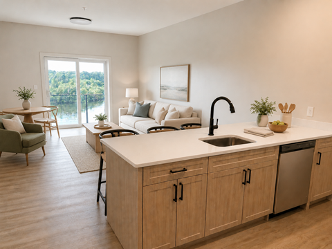 A modern kitchen with a large island and a view of the outdoors.