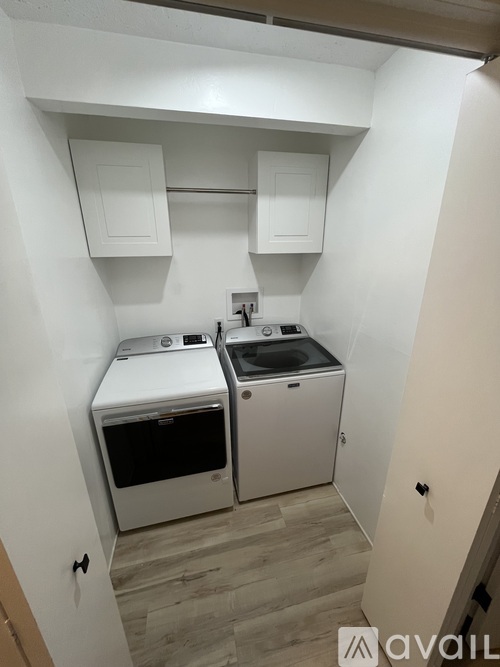 A small kitchen with a dishwasher and an oven.
