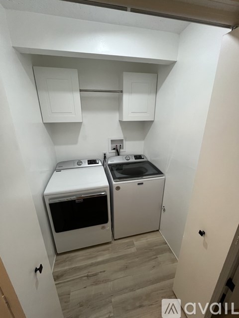 A small kitchen with a dishwasher and an oven.