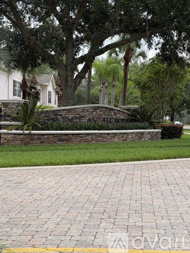 A brick wall with a sign that says "Gateway" on it.