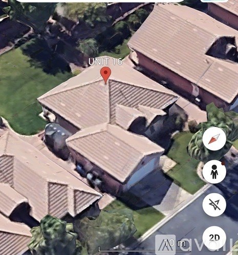 A satellite image shows a building with a red marker indicating a unit to the left.