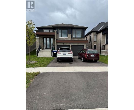 A house with a car parked in front of it.