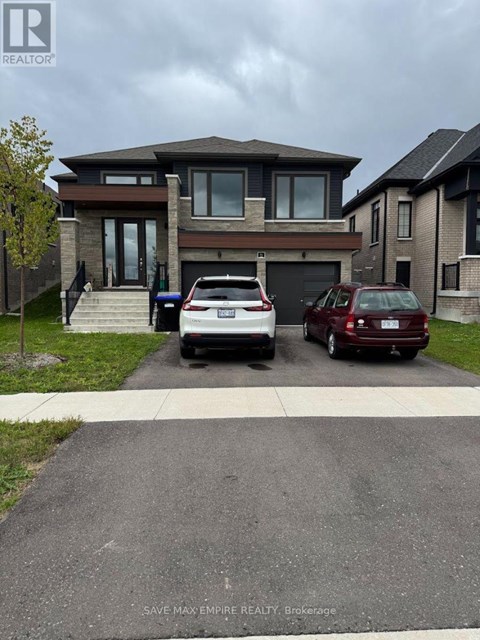 A house with a car parked in front of it.