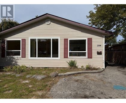 A small house with the number 284 on the front door.