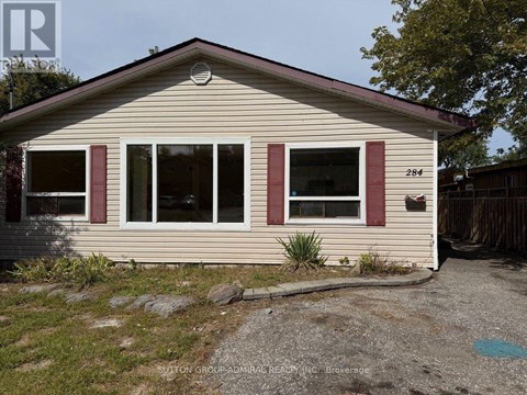 A small house with the number 284 on the front door.