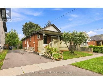A house with a driveway in front of it.