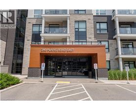 The entrance to a building with the sign 340 Plains Road East.