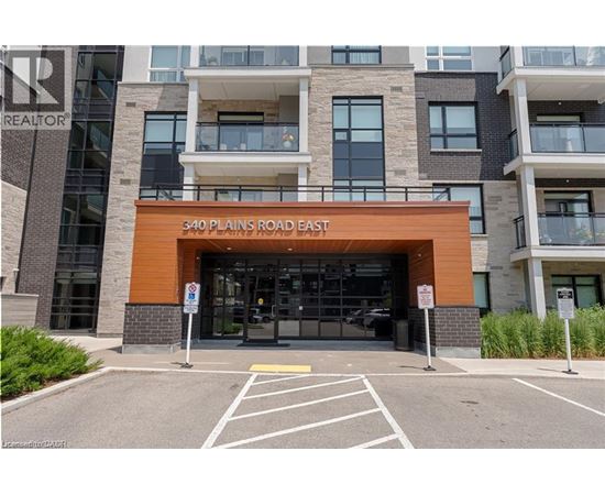 The entrance to a building with the sign 340 Plains Road East.