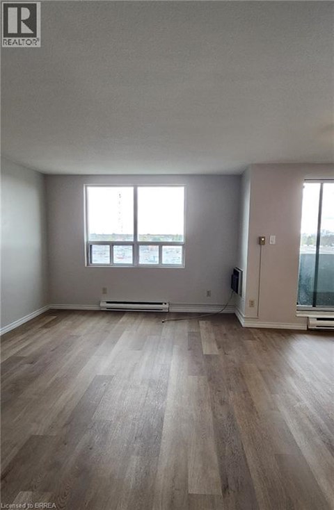 A room with a window and a door is on the market.