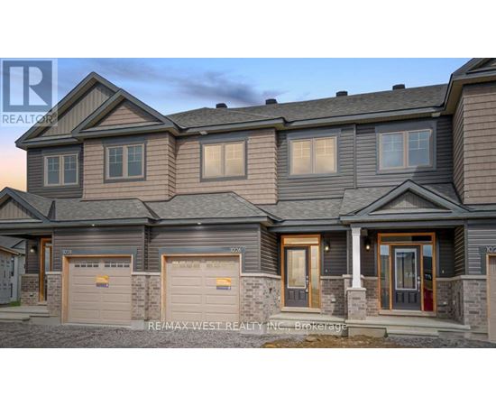 A modern two-story house with a garage on the left side.